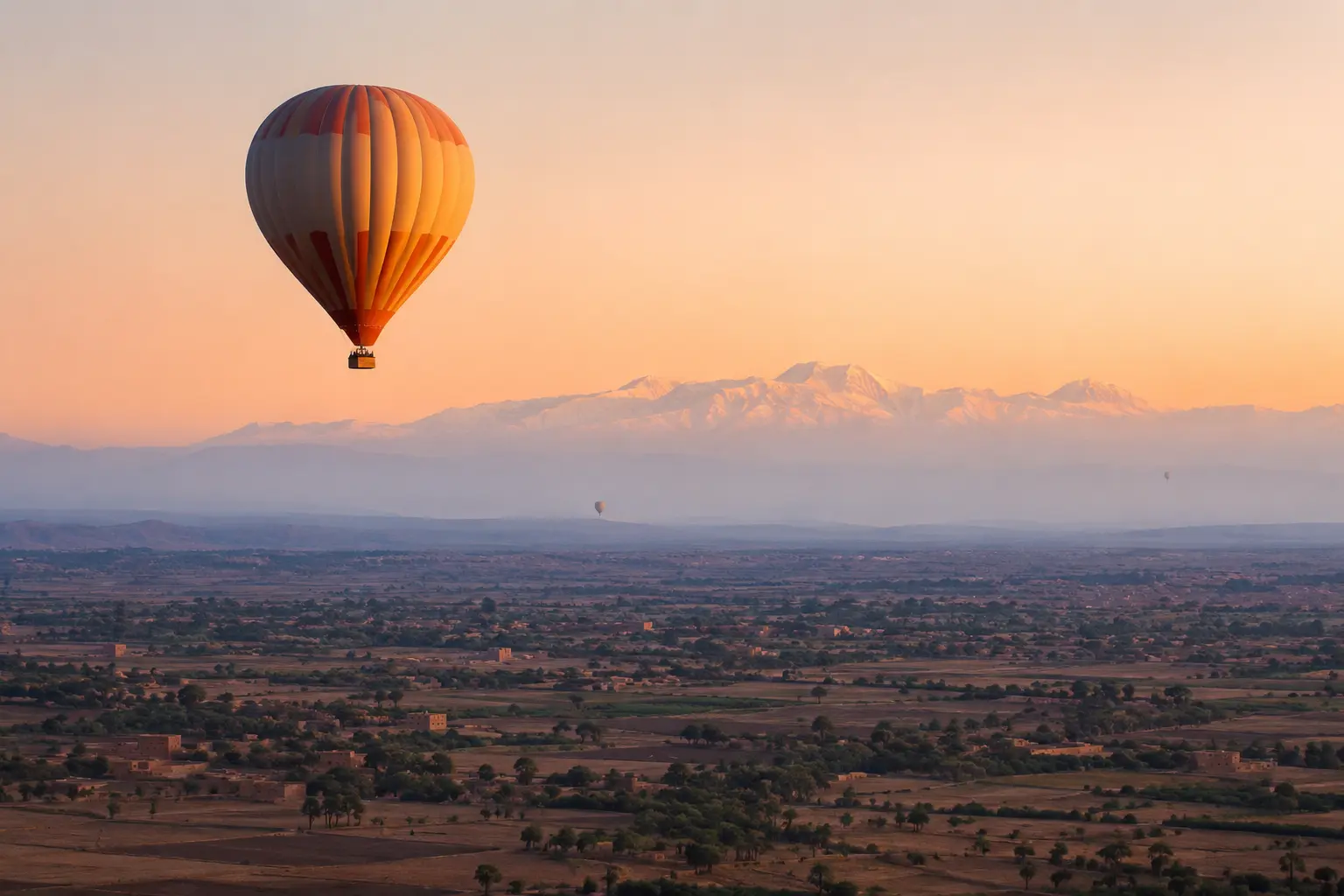 Hot-air balloon over the Marrakech countryside at sunrise